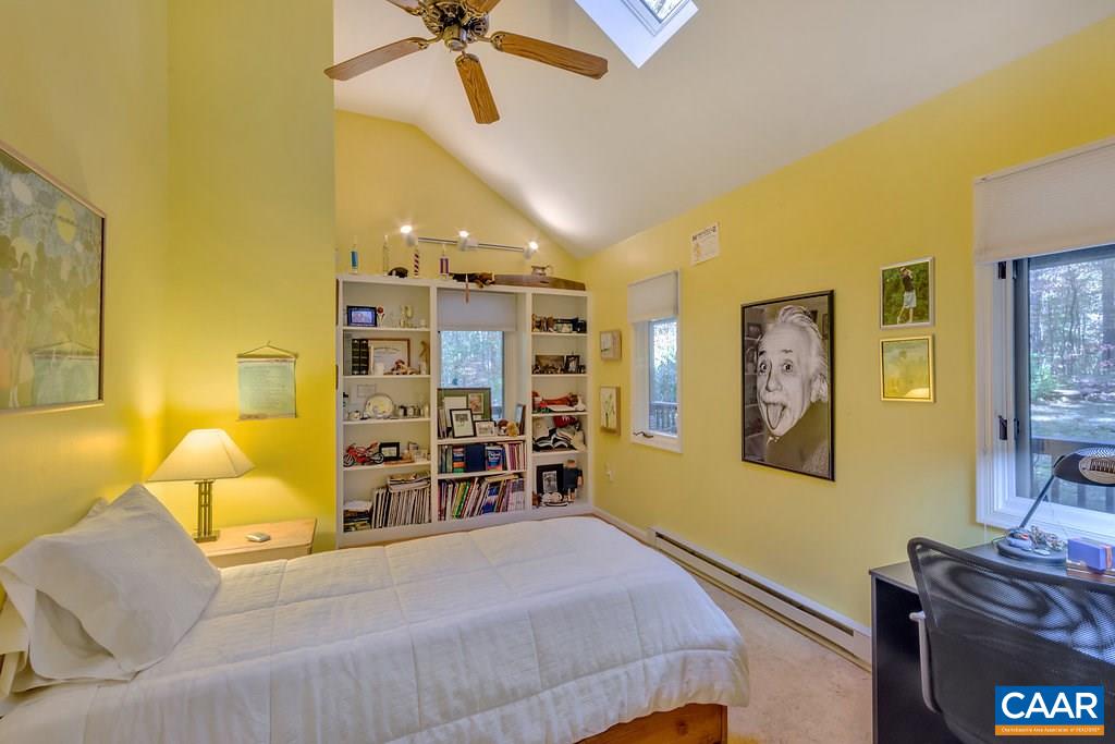 3272 Buck Island Road Charlottesville, VA 22902 - Photo 15 of 41 a bedroom with a bed and furniture