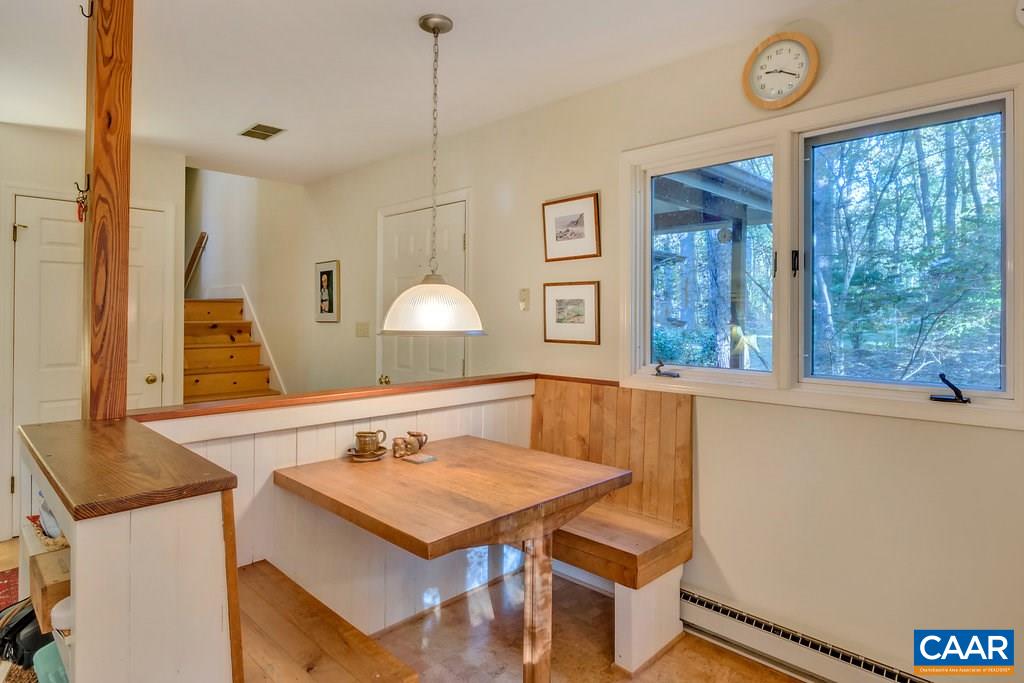 3272 Buck Island Road Charlottesville, VA 22902 - Photo 6 of 41 a view of a dining room with furniture and window