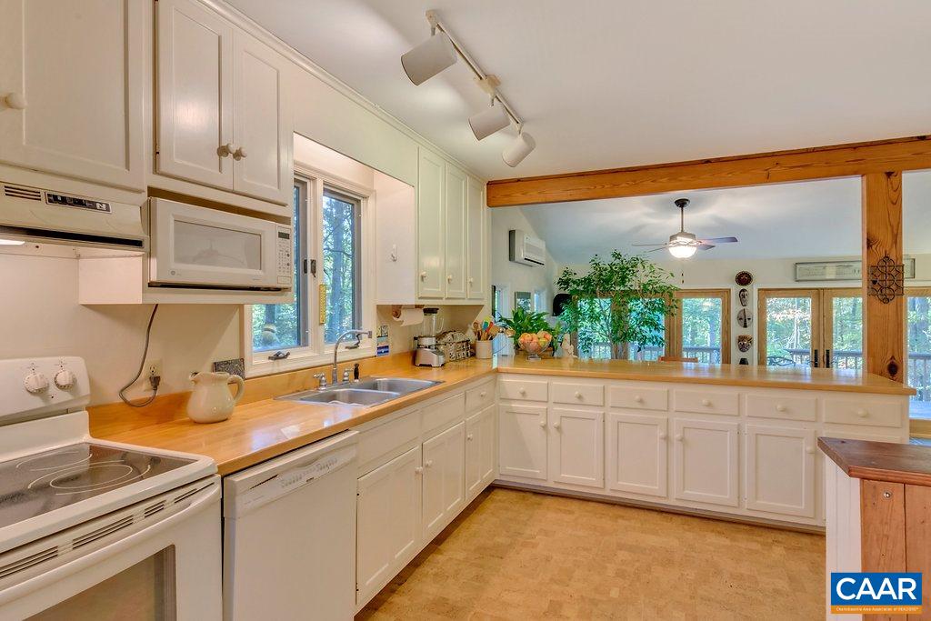 3272 Buck Island Road Charlottesville, VA 22902 - Photo 7 of 41 a kitchen with a sink and cabinets