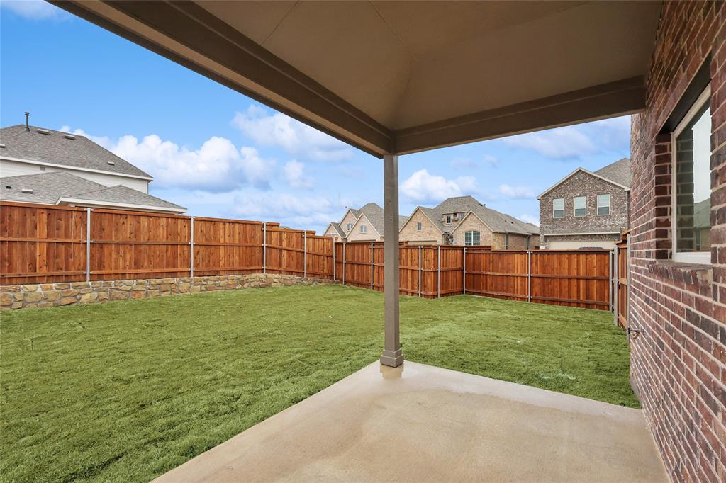 3900 Coco Lane Sherman, TX 75090 - Photo 23 of 40 View of yard featuring a patio
