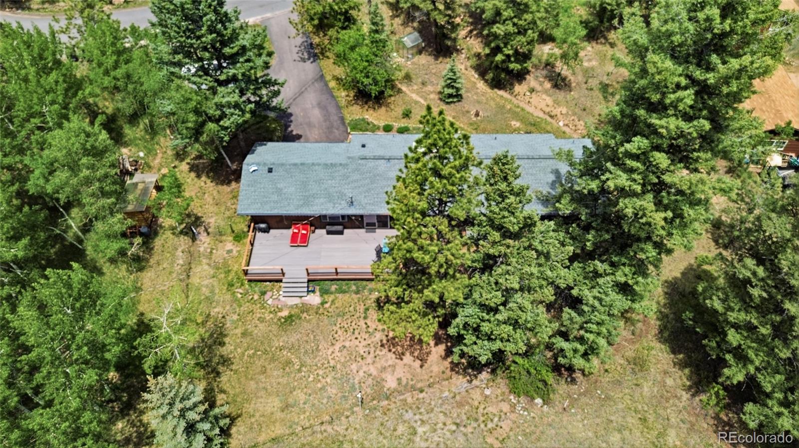 31280 Florence Road Conifer, CO 80433 - Photo 44 of 48 an aerial view of residential house with space and trees all around