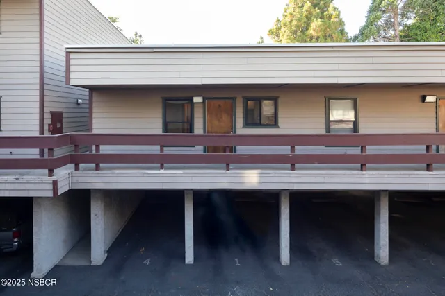a bathroom with a sink and a large window