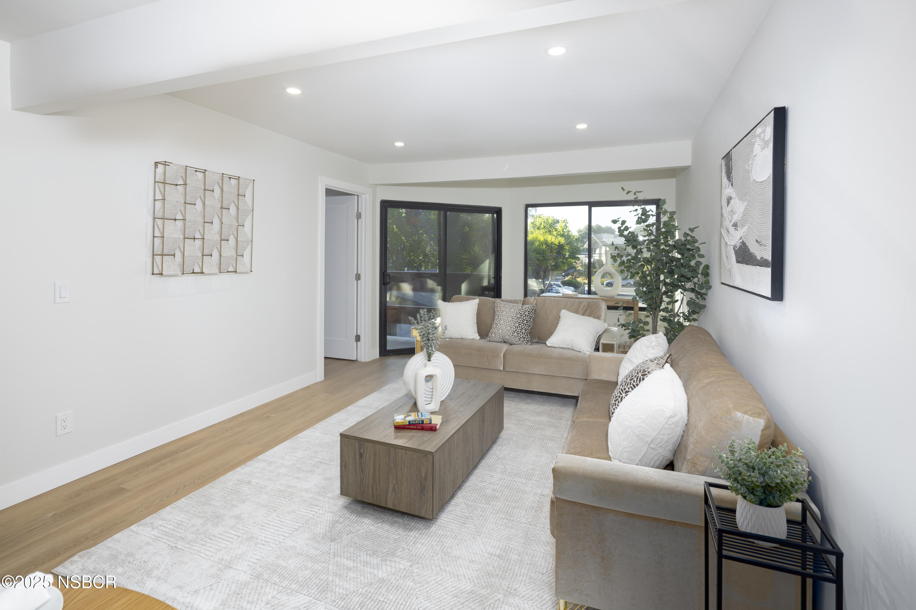 680 Chorro Street, Unit 5 San Luis Obispo, CA 93401 - Photo 2 of 24 a living room with furniture and a large window