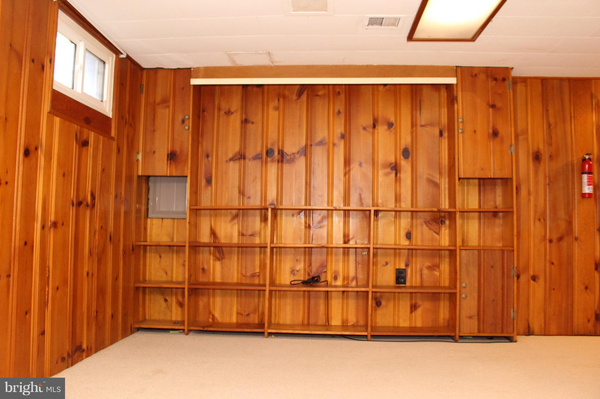 12704 Goodhill Road Silver Spring, MD 20906 - Photo 25 of 30 Basement with Knotty Pine paneling