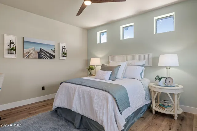 a balcony with table and chairs