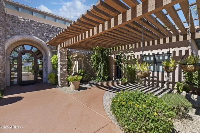 a table and chairs in a balcony