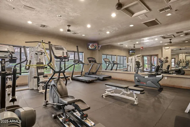 a view of swimming pool with outdoor seating