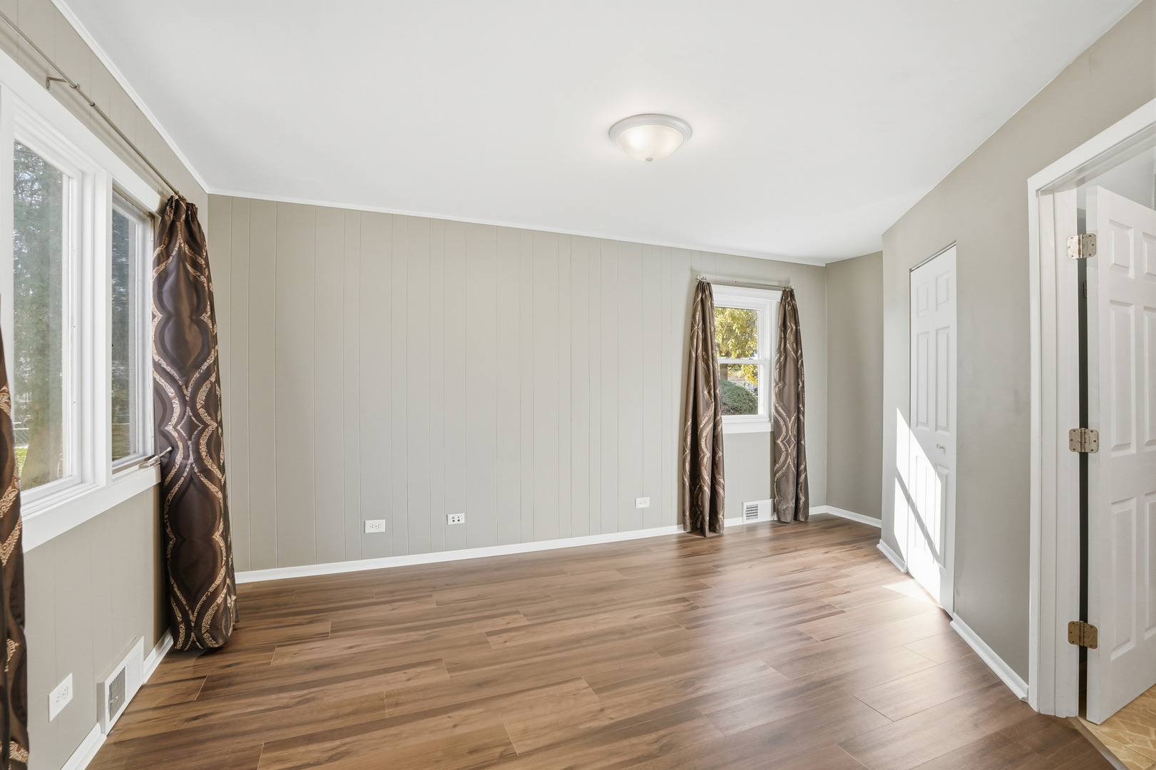 3439 Sangamon Street Steger, IL 60475 - Photo 13 of 25 a view of livingroom with hardwood floor and hallway