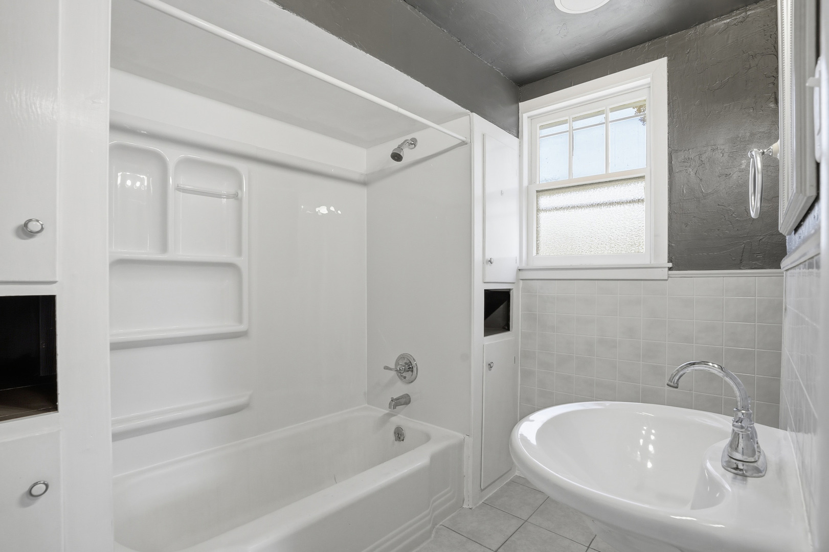 3439 Sangamon Street Steger, IL 60475 - Photo 18 of 25 a white bath tub sitting next to a white sink