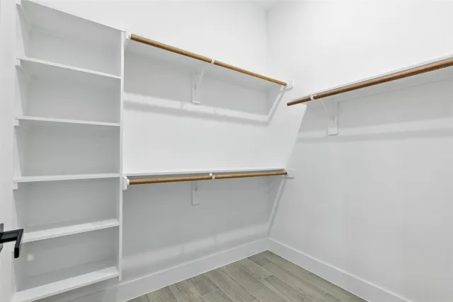 a view of backyard of house and garage