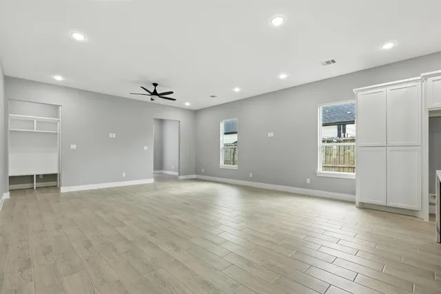 a view of a kitchen with a sink and a stove