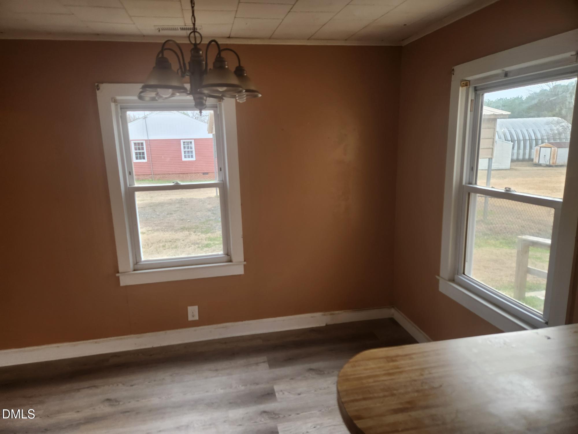 83 Wimberly Road Moncure, NC 27559 - Photo 12 of 17 a bedroom with a bed and a window