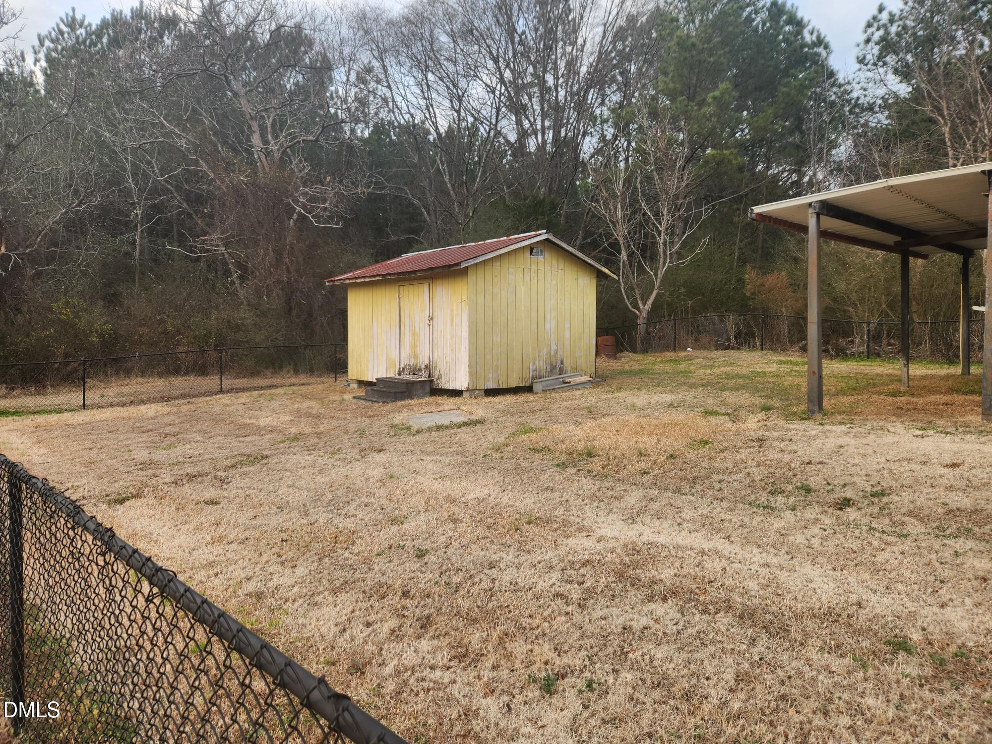 83 Wimberly Road Moncure, NC 27559 - Photo 7 of 17 a view of backyard of house