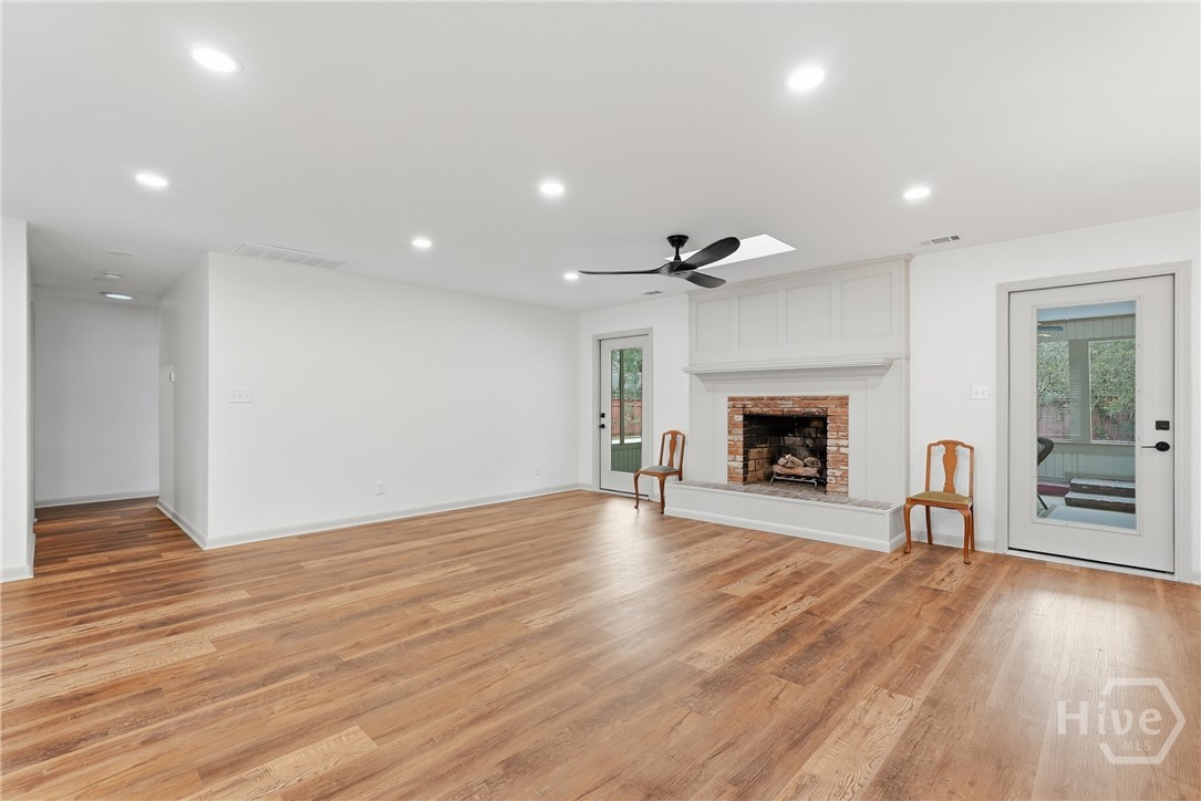 105 Carlton Road Savannah, GA 31410 - Photo 4 of 48 Doors to Sunroom on both sides of Fireplace