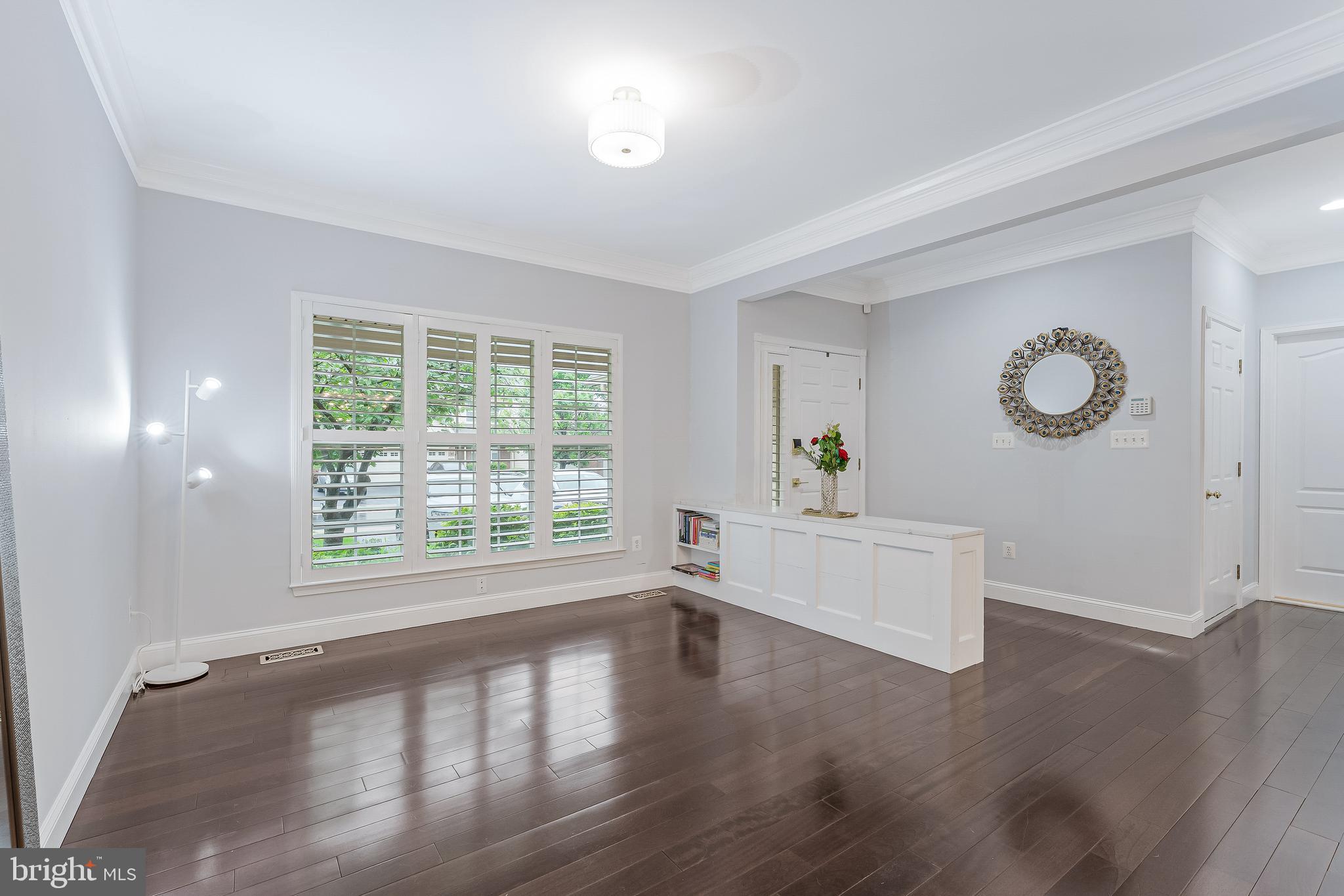 19599 Aspendale Square Ashburn, VA 20147 - Photo 11 of 56 a living room with furniture and a large window