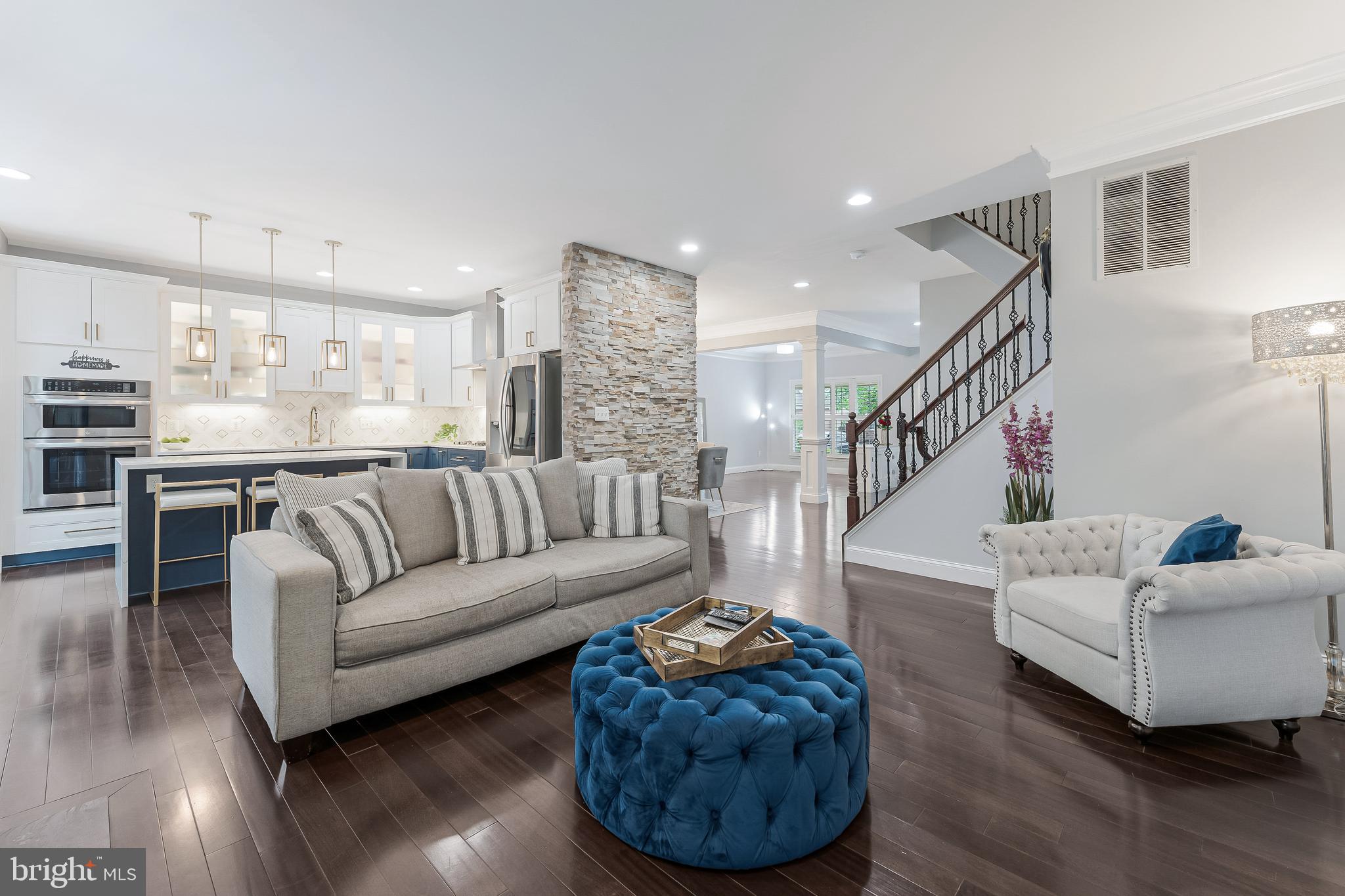 19599 Aspendale Square Ashburn, VA 20147 - Photo 21 of 56 a living room with furniture and wooden floor