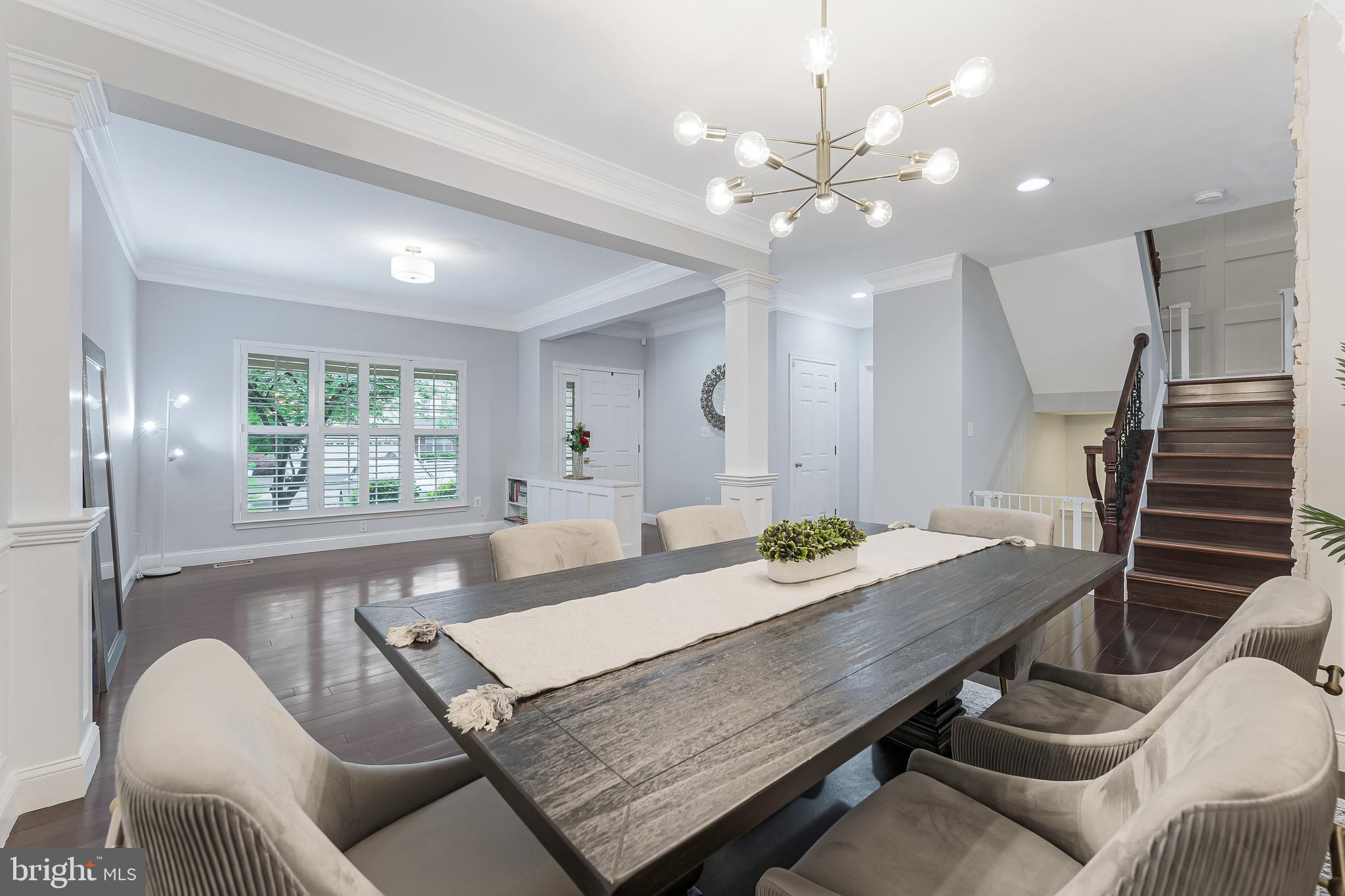 19599 Aspendale Square Ashburn, VA 20147 - Photo 24 of 56 a view of a dining room with furniture and wooden floor