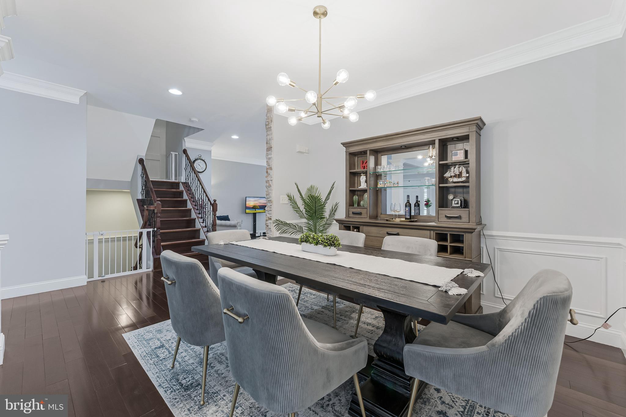 19599 Aspendale Square Ashburn, VA 20147 - Photo 25 of 56 a view of a dining room with furniture and wooden floor