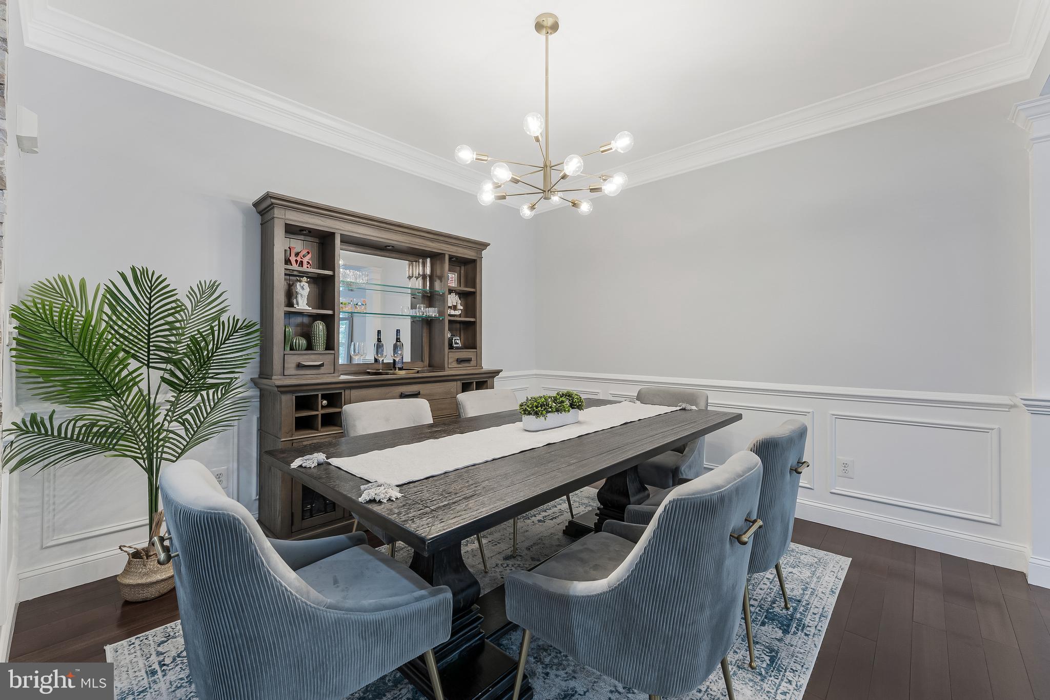19599 Aspendale Square Ashburn, VA 20147 - Photo 26 of 56 a view of a dining room with furniture window and wooden floor