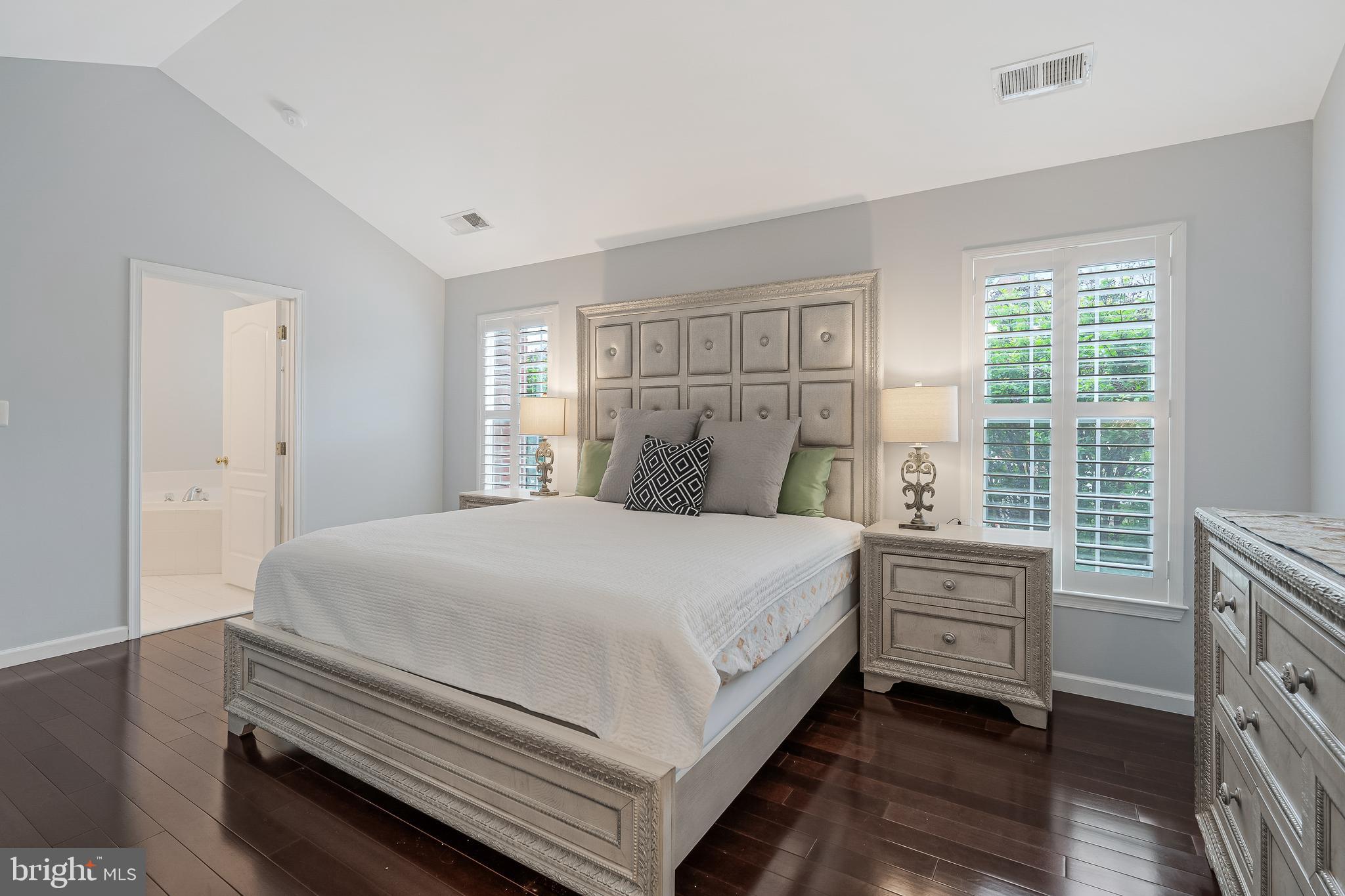 19599 Aspendale Square Ashburn, VA 20147 - Photo 31 of 56 a bedroom with a bed and windows