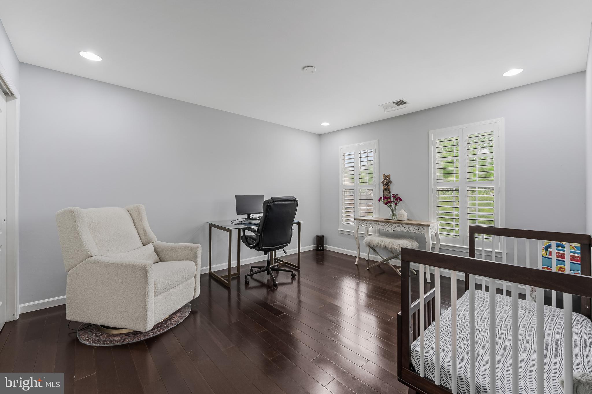 19599 Aspendale Square Ashburn, VA 20147 - Photo 37 of 56 a workspace with furniture hardwood and a window
