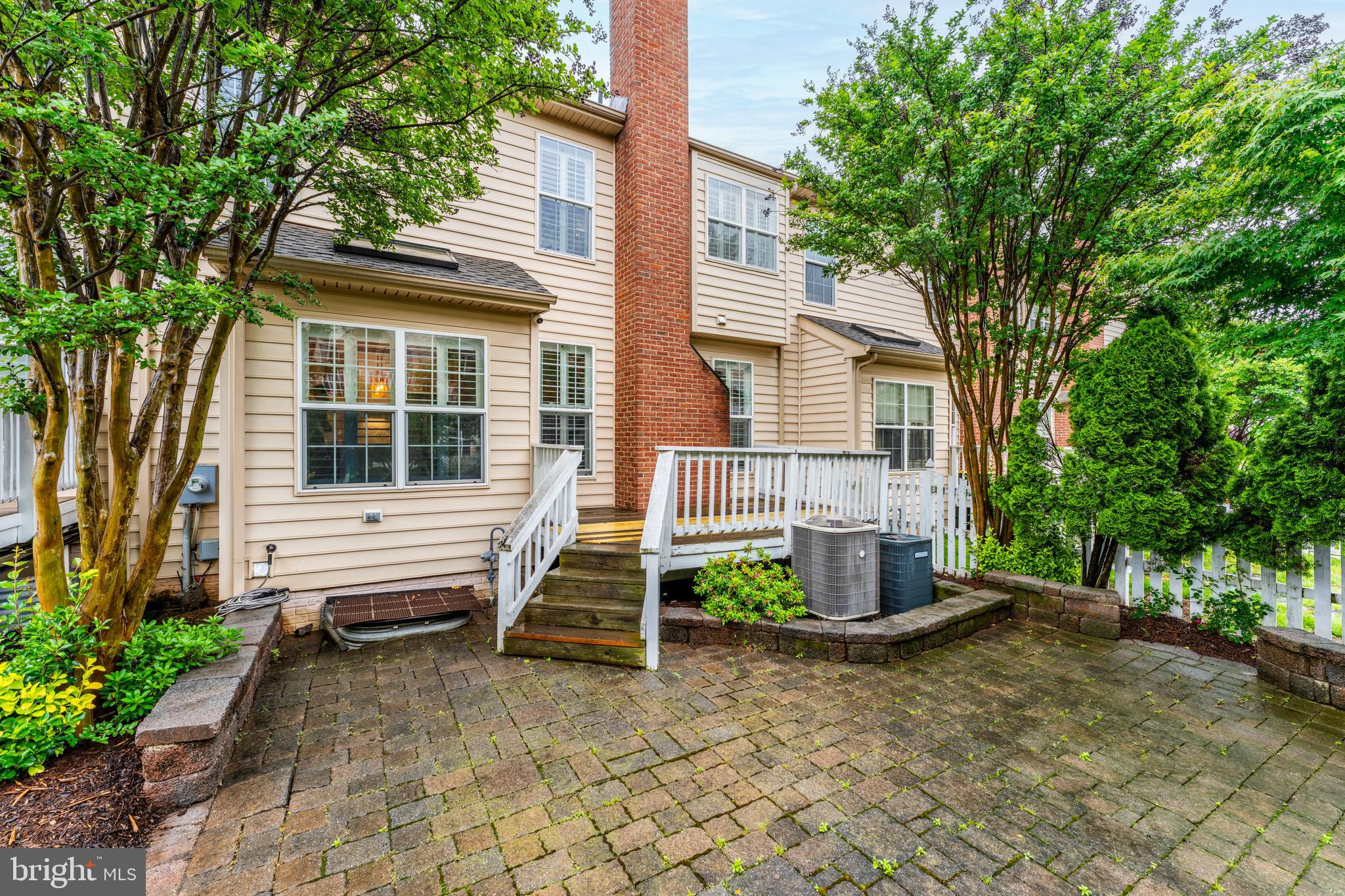 19599 Aspendale Square Ashburn, VA 20147 - Photo 47 of 56 a view of a house with a yard