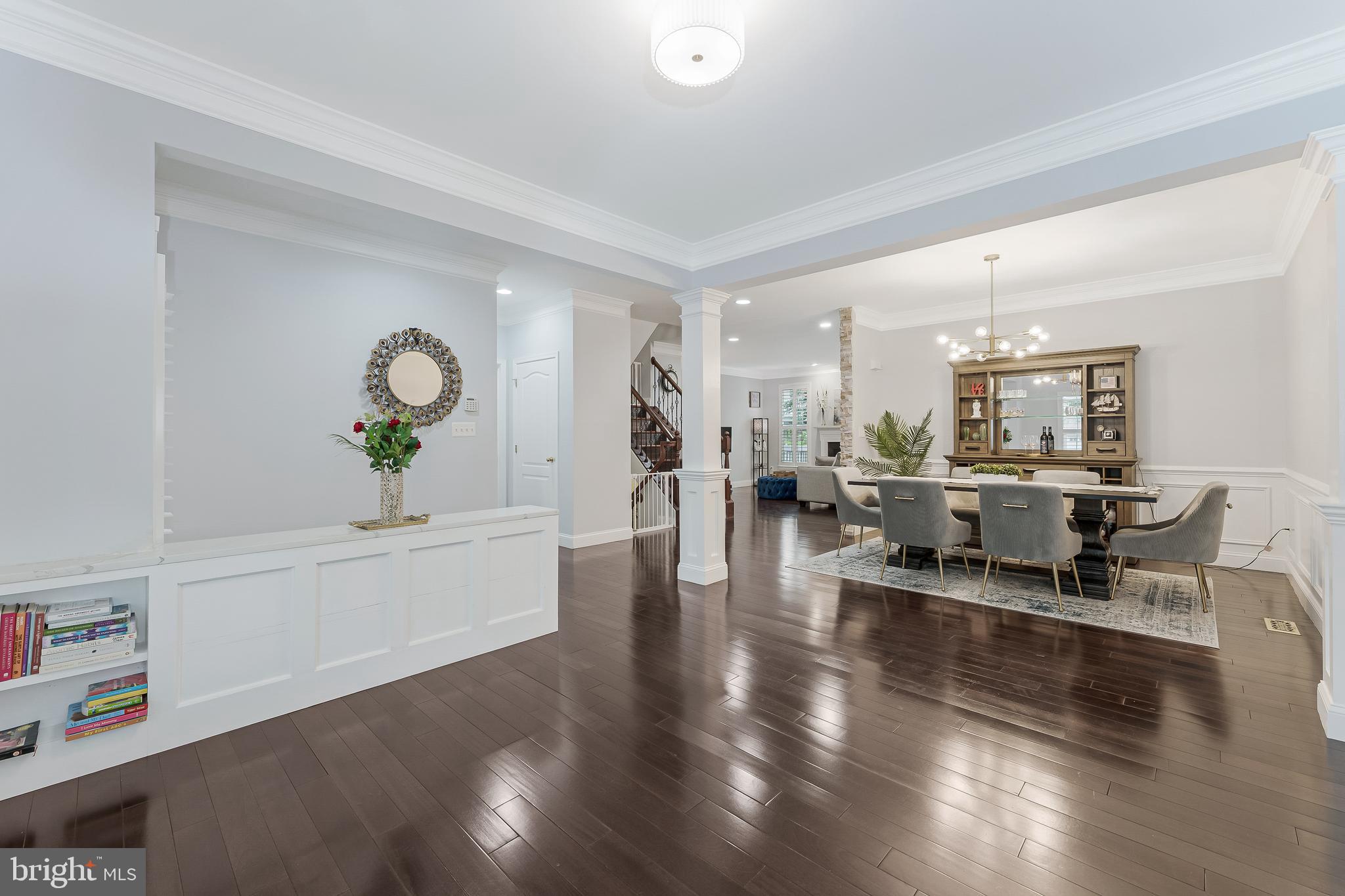 19599 Aspendale Square Ashburn, VA 20147 - Photo 10 of 56 a living room with furniture and a wooden floor