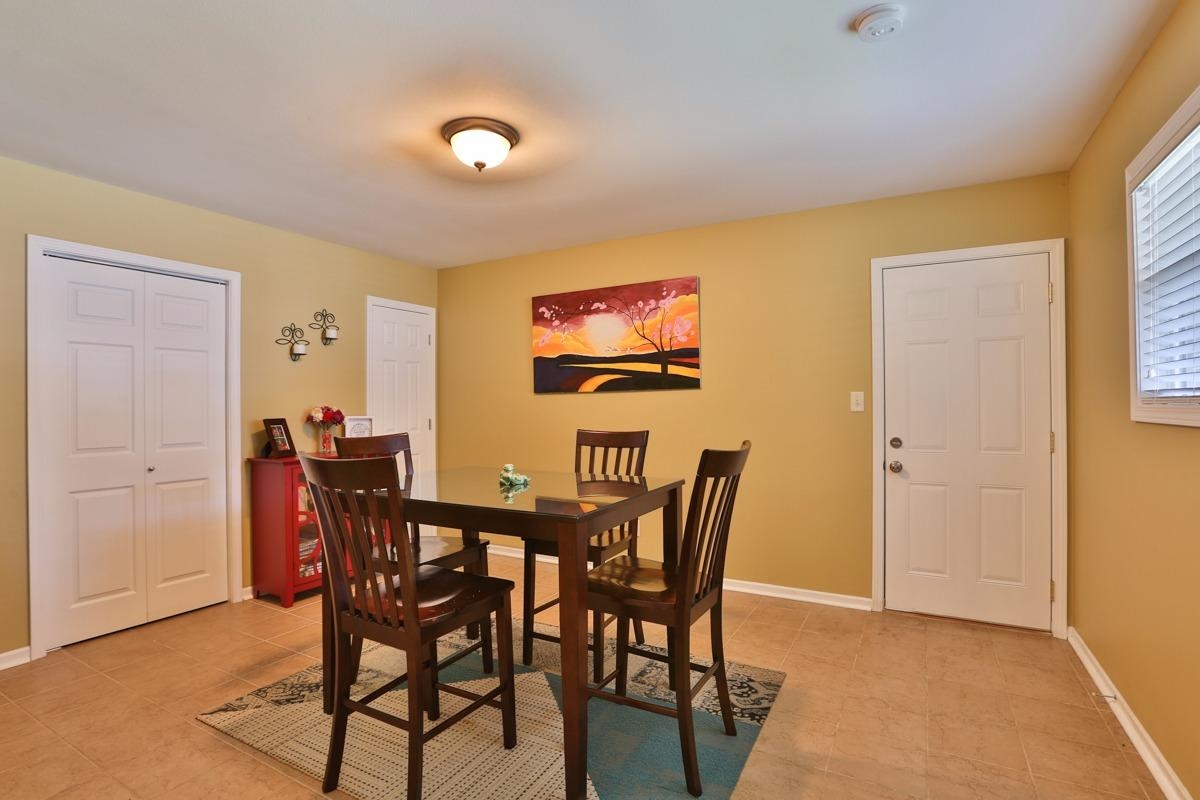 1035 North Indiana Street Griffith, IN 46319 - Photo 2 of 10 a view of a dining room with furniture and window