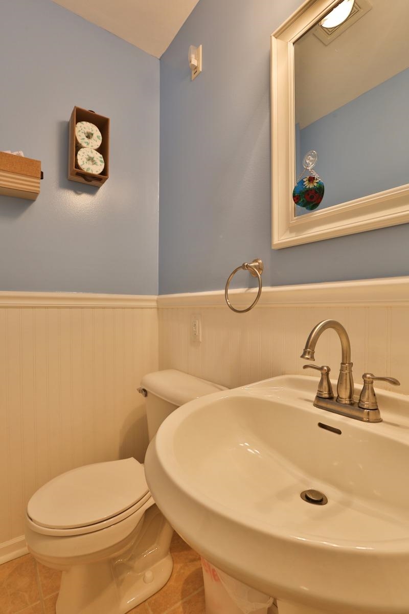 1035 North Indiana Street Griffith, IN 46319 - Photo 5 of 10 a bathroom with a sink and a toilet