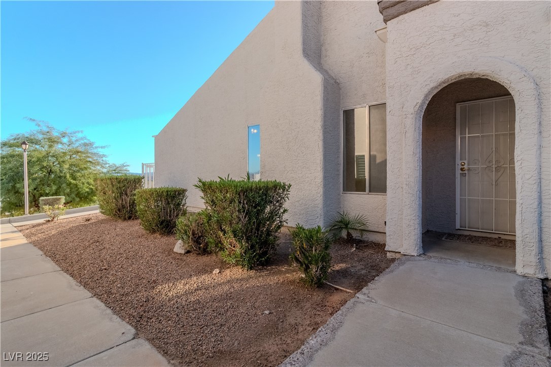 2225 Pebble Creek Lane Laughlin, NV 89029 - Photo 41 of 87 View of property exterior with stucco siding