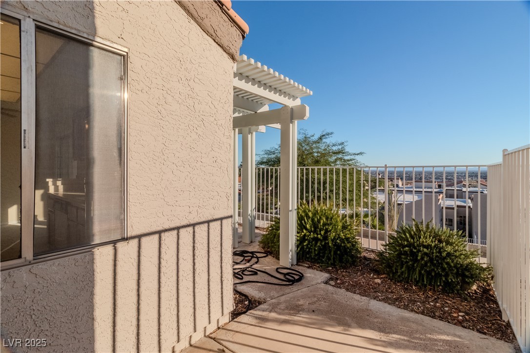 2225 Pebble Creek Lane Laughlin, NV 89029 - Photo 61 of 87 Balcony with a pergola