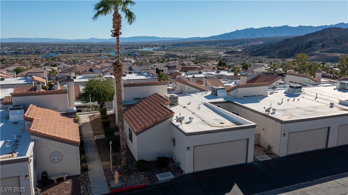 2225 Pebble Creek Lane Laughlin, NV 89029 - Photo 66 of 87 Aerial perspective of suburban area featuring a mountain backdrop