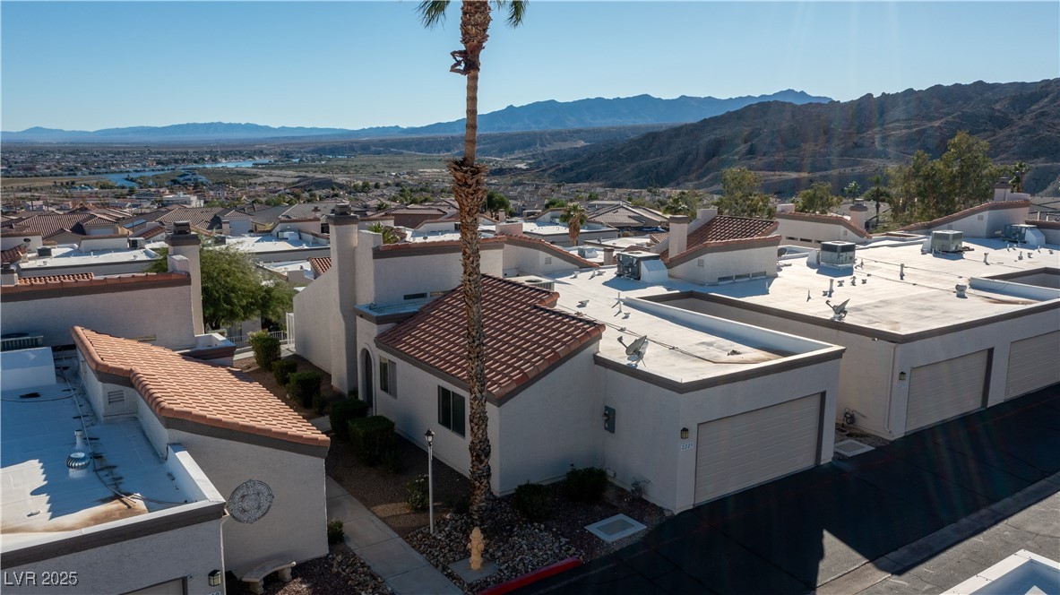 2225 Pebble Creek Lane Laughlin, NV 89029 - Photo 80 of 87 Aerial view of residential area with a mountainous background