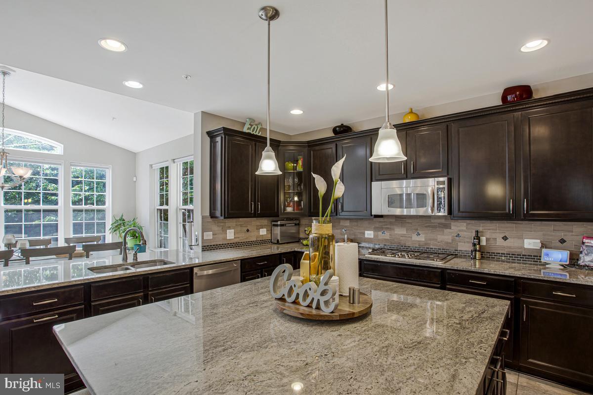 8704 Alexa Road Clinton, MD 20735 - Photo 12 of 42 Bright breakfast area beside the kitchen