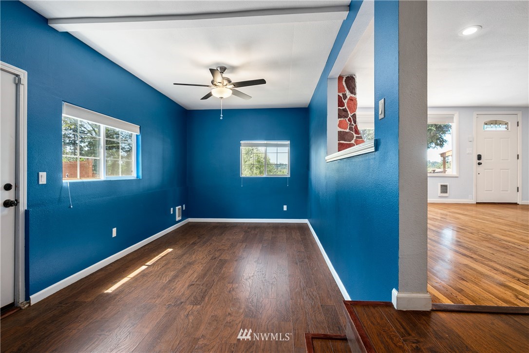 23925 7th Avenue West Bothell, WA 98021 - Photo 12 of 28 wooden floor in an empty room with a window