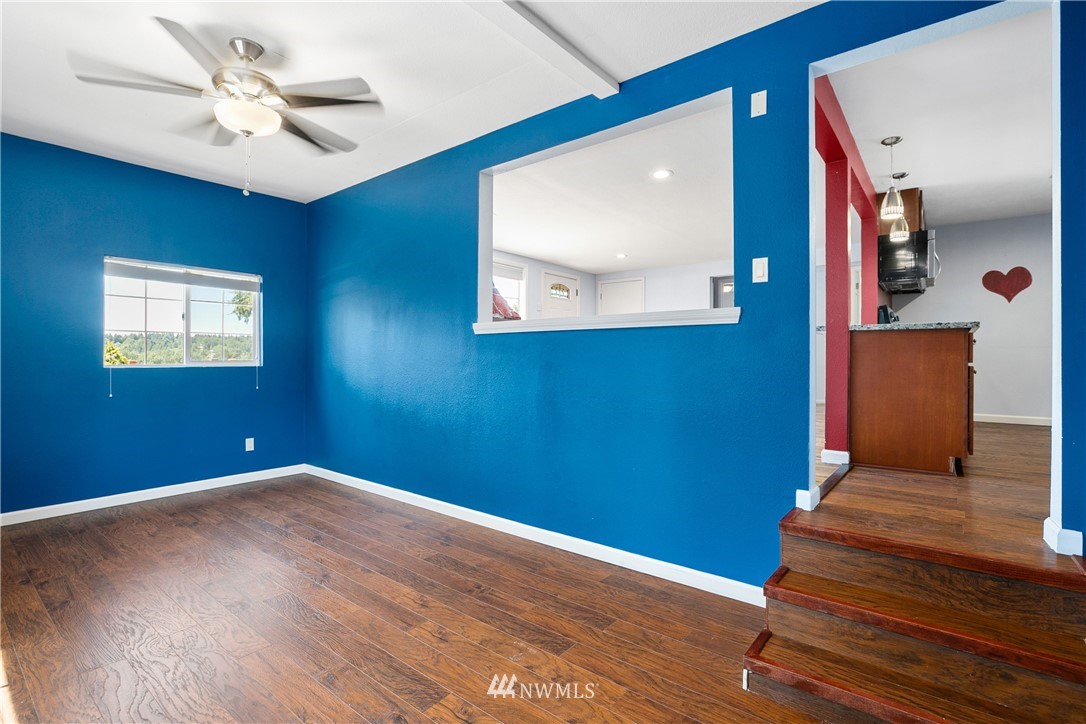23925 7th Avenue West Bothell, WA 98021 - Photo 13 of 28 a view of an empty room with wooden floor