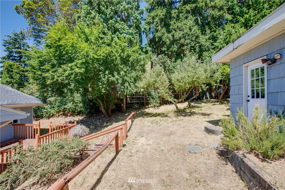 23925 7th Avenue West Bothell, WA 98021 - Photo 25 of 28 a view of a yard with plants and large trees