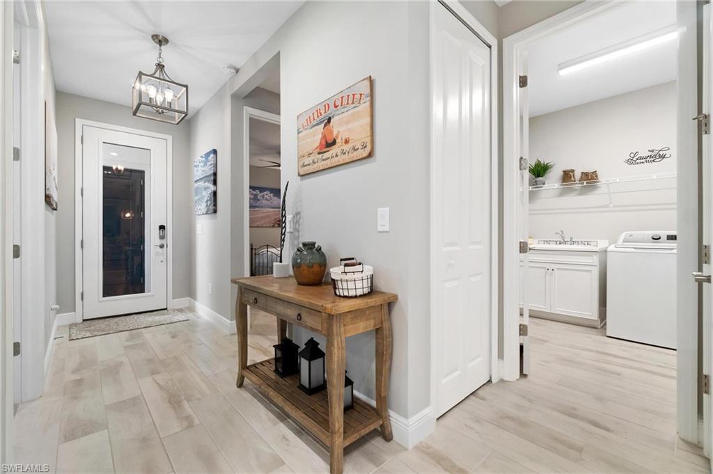 2298 Marquesa Circle Naples, FL 34112 - Photo 22 of 50 a view of a kitchen and an empty room
