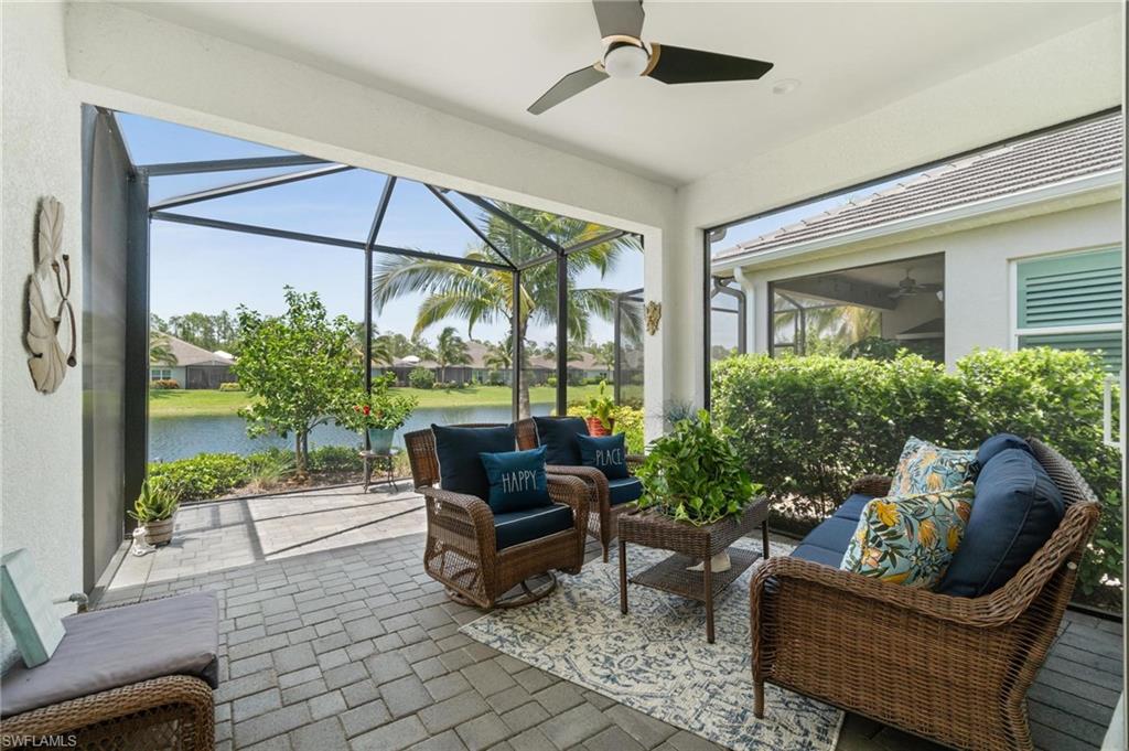 2298 Marquesa Circle Naples, FL 34112 - Photo 24 of 50 a outdoor living space with furniture and garden