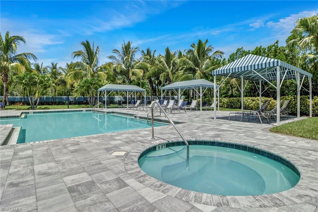 2298 Marquesa Circle Naples, FL 34112 - Photo 46 of 50 a view of a swimming pool with a patio