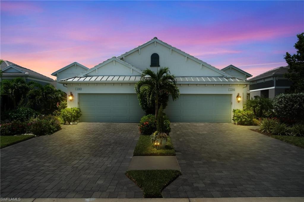 2298 Marquesa Circle Naples, FL 34112 - Photo 50 of 50 a front view of a house with garden