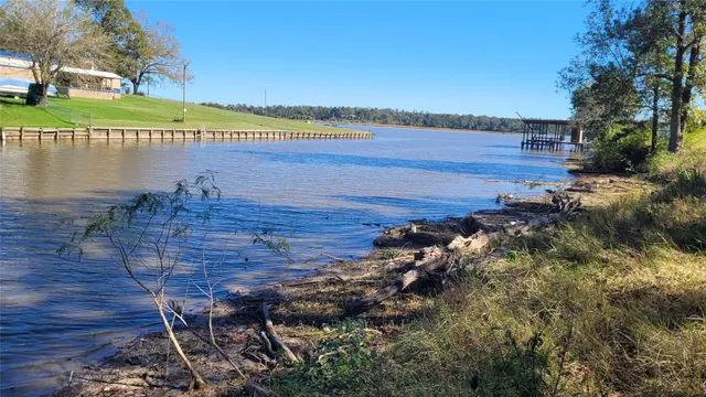 a view of a lake from a yard
