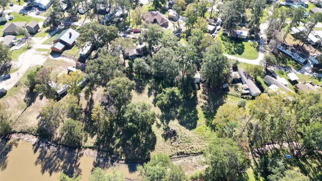 a backyard of a house with lots of trees