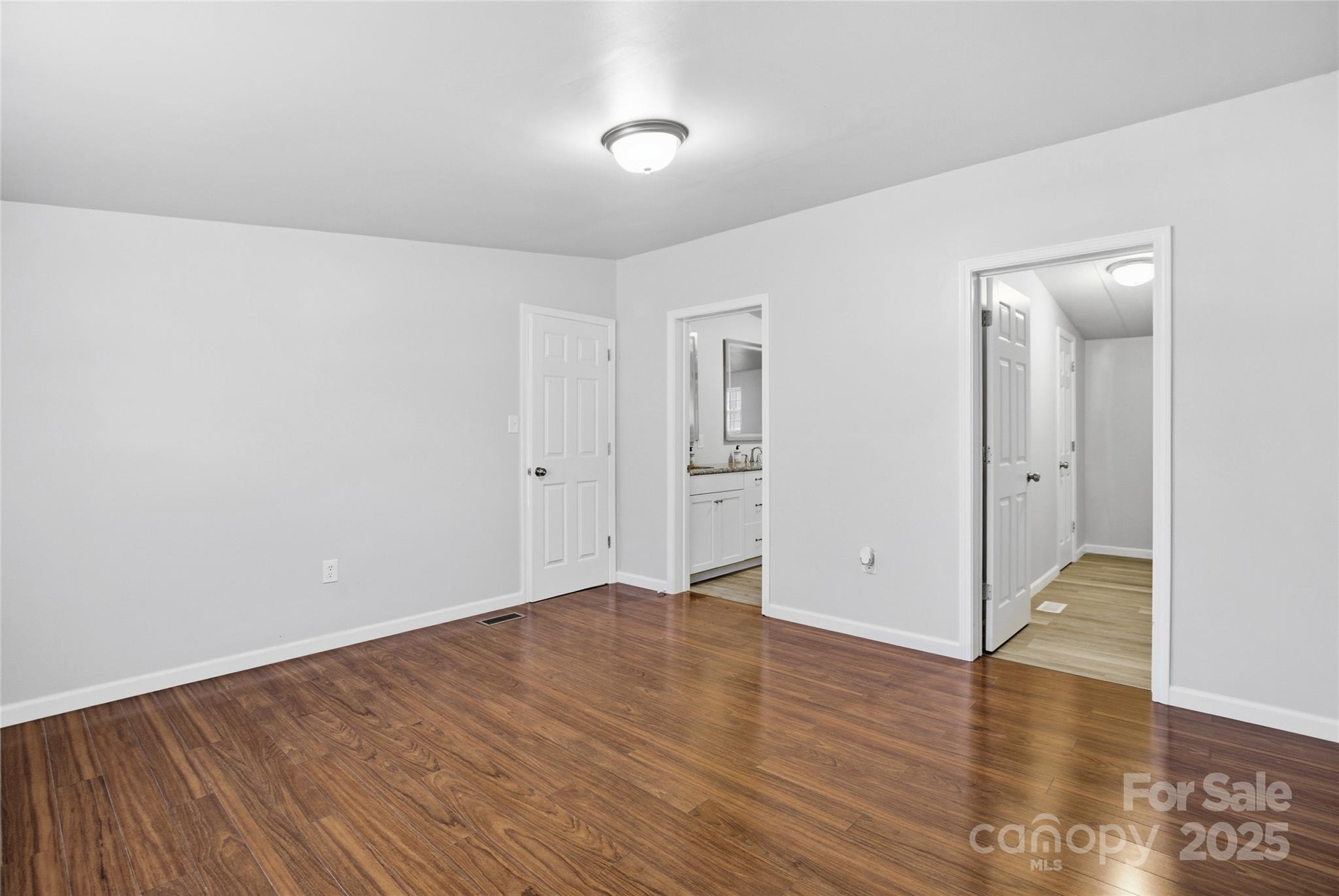 2425 Shoal Creek Church Road Shelby, NC 28152 - Photo 16 of 33 a view of an empty room with wooden floor