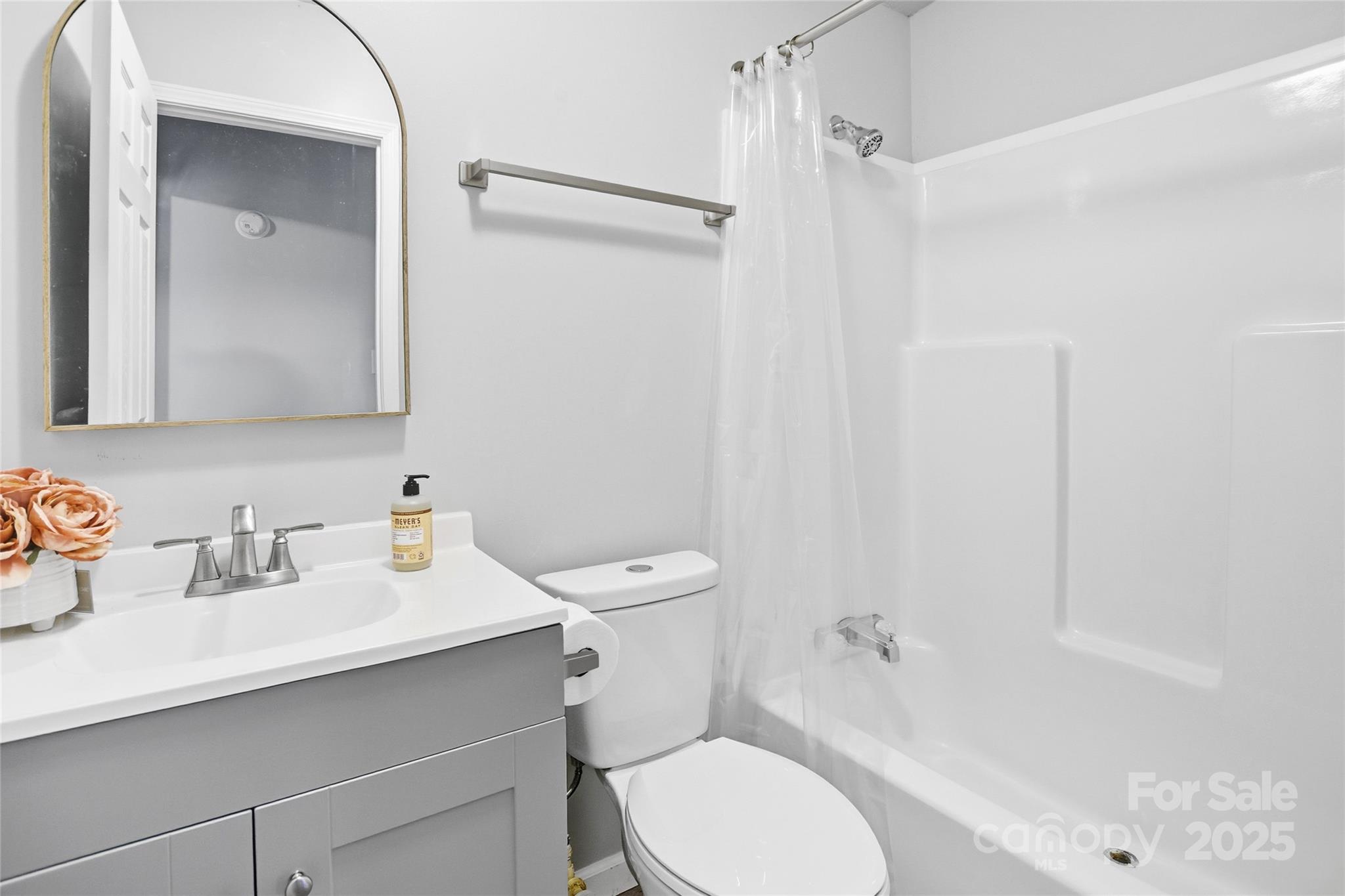 2425 Shoal Creek Church Road Shelby, NC 28152 - Photo 29 of 33 a bathroom with a sink toilet vanity and shower
