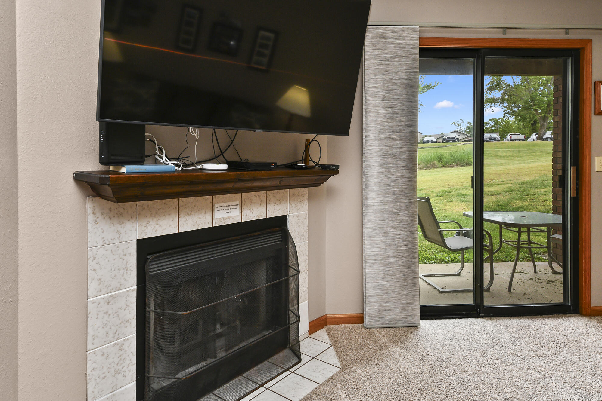 267 Bunker Ridge Drive, Unit 6 Branson, MO 65616 - Photo 12 of 29 Fireplace & Back porch