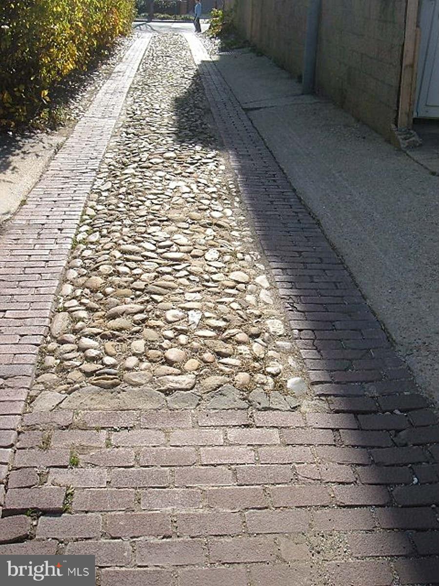 3 Library Court Southeast Washington, DC 20003 - Photo 2 of 29 Follow a cobblestone path to the past...