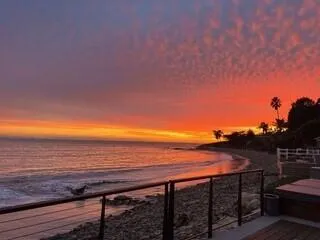 a view of an ocean from a balcony