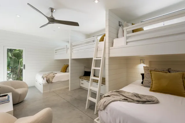 a bed room with a bed and a couch