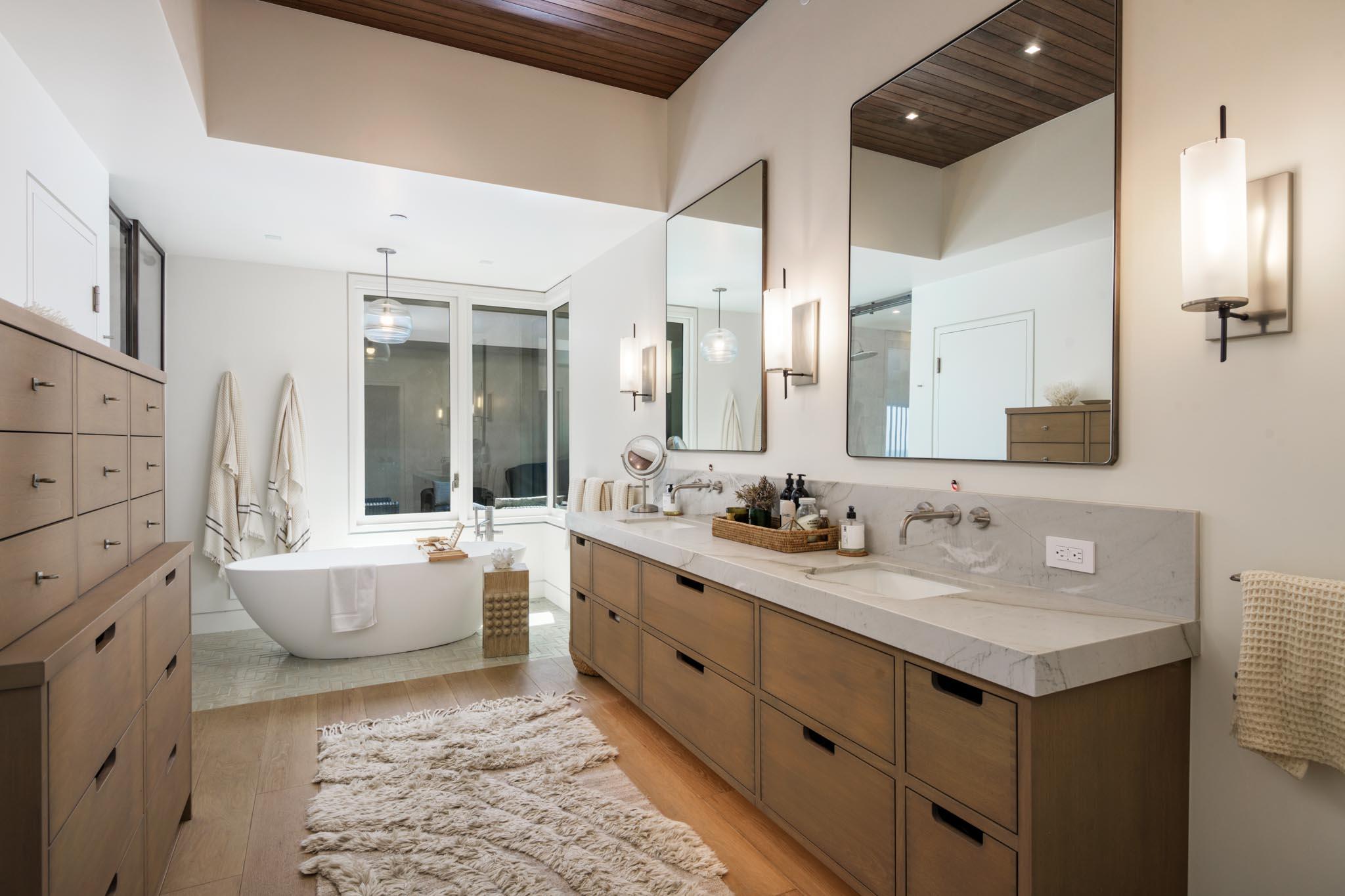 1821 Fernald Point Lane Montecito, CA 93108 - Photo 19 of 28 a bathroom with a double vanity sink mirror and bathtub